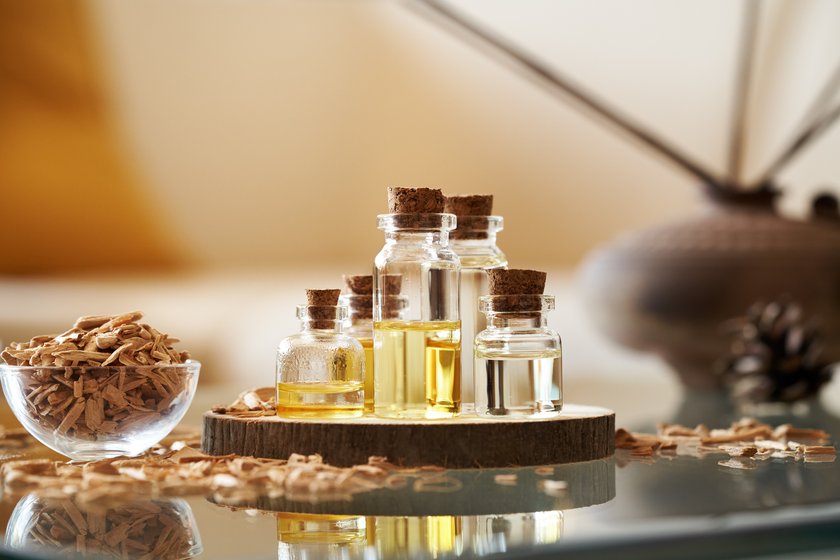 Cedar wood essential oil for sleep on a table Cedar wood essential oil for sleep on a table